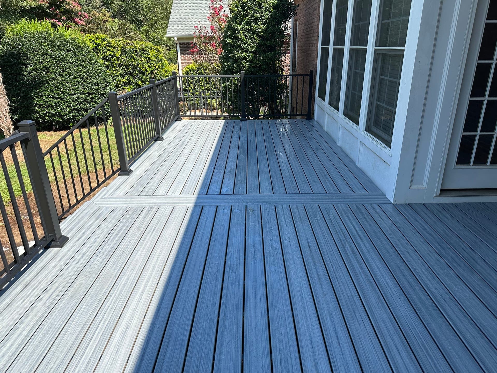 Composite deck installation showcasing weather-resistant features in a Carolina backyard